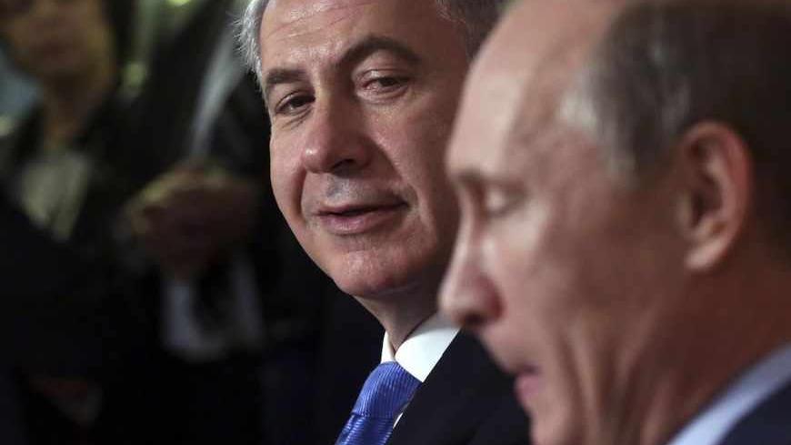 Russian President Vladimir Putin (R) and Israeli Prime Minister Benjamin Netanyahu attend a news conference at the Bocharov Ruchei state residence in the Black Sea resort of Sochi, May 14, 2013. Putin said on Tuesday it was important to avoid actions that might aggravate Syria's civil war, a veiled warning against foreign military intervention or arming anti-government forces. REUTERS/Maxim Shipenkov/Pool (RUSSIA - Tags: POLITICS) - RTXZLY6