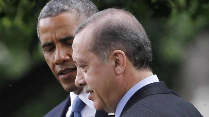 U.S. President Barack Obama (L) bids Turkey's Prime Minister Recep Tayyip Erdogan farewell following their joint news conference in the Rose Garden of the White House in Washington, May 16, 2013.     REUTERS/Jason Reed    (UNITED STATES - Tags: POLITICS) - RTXZPFD