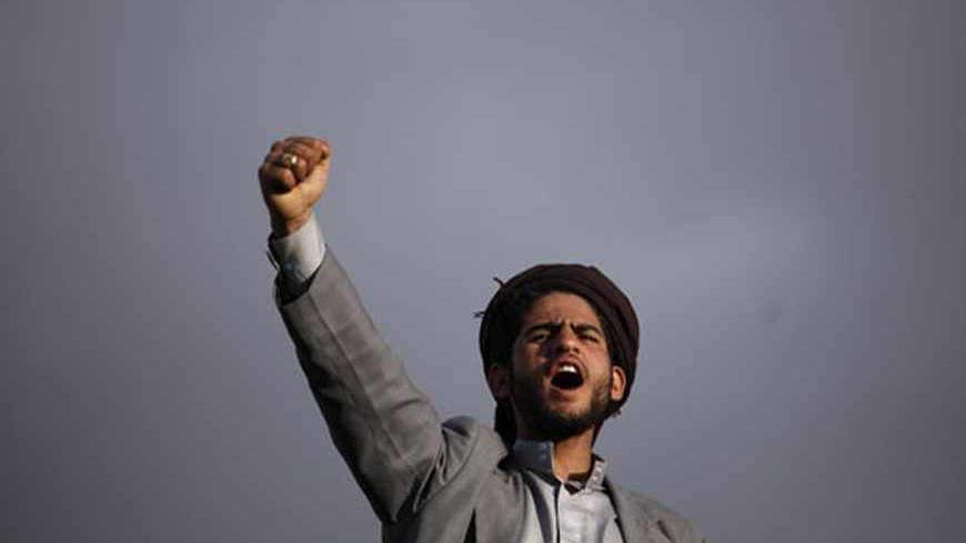 A supporter of the Shi'ite al-Houthi rebel group shouts slogans during a demonstration in Sanaa, against the deportation of Yemeni labourers from Saudi Arabia, April 5, 2013. Saudi Arabia has begun deporting thousands of Yemeni labourers following new regulations requiring foreigners to work only for their sponsors, a Yemeni official said on Monday, a move that could "significantly damage" the poor country's economy. Some two million of Yemen's 25 million citizens work abroad, more than half of them in larg