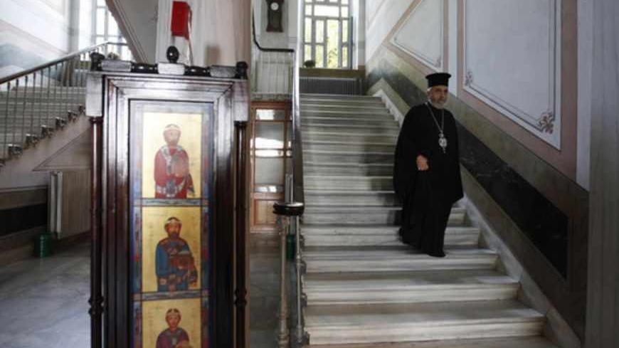 Metropolitan Apostolos Daniilidis, an Orthodox bishop at the monastery attached to the Halki school, is seen at the "Tracing Istanbul", an exhibition of works by Greek artists, at the Greek Orthodox seminary in Heybeliada island near Istanbul September 4, 2010. An Istanbul seminary closed in 1971 is hosting its first public event in 40 years, raising hopes it may shortly be reopened by Turkey and once again educate priests for the Greek Orthodox community. The European Union and the United States have press