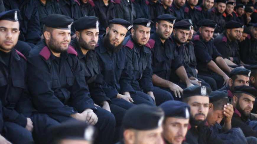 Members of Hamas police take part in a graduation ceremony in Gaza City December 17, 2012. REUTERS/Suhaib Salem (GAZA - Tags: POLITICS MILITARY) - RTR3BO8S
