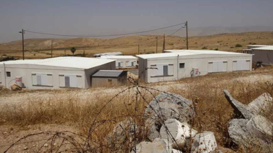 Prefabricated houses are seen in the West Bank Jewish settlement of Maskiot in this May 18, 2009 file photo. Perched on a grassy slope on the western Jordan Valley, Maskiot overlooks Jordan from the Israeli-occupied West Bank, home to 2.5 million Palestinians who oppose the presence of settlers who have spread among them over the past 30 years. Picture taken May 18, 2009. REUTERS/Baz Ratner/Files (WEST BANK POLITICS CONFLICT) - RTXRN8Q