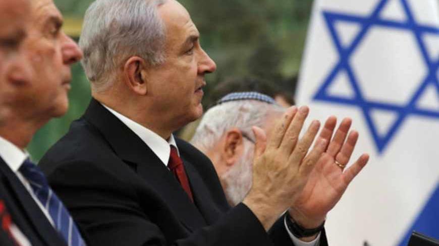 Israel's Prime Minister Benjamin Netanyahu speaks to China's President Xi Jinping (not pictured) during a meeting at the Great Hall of the People in Beijing May 9, 2013. Netanyahu is on an official visit to China between May 6 and 10.  REUTERS/Kim Kyung-Hoon (CHINA - Tags: POLITICS) - RTXZFXC