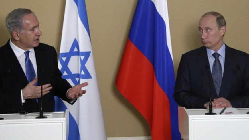 Russian President Vladimir Putin (R) and Israeli Prime Minister Benjamin Netanyahu attend a news conference at the Bocharov Ruchei state residence in the Black Sea resort of Sochi, May 14, 2013. Putin said on Tuesday it was important to avoid actions that might aggravate Syria's civil war, a veiled warning against foreign military intervention or arming anti-government forces. REUTERS/Maxim Shipenkov/Pool (RUSSIA - Tags: POLITICS) - RTXZLY7