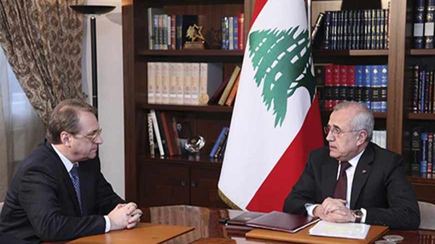 Lebanon's President Michel Suleiman (R) meets with Russia's Deputy Foreign Minister Mikhail Bogdanov at the presidential palace in Baabda, near Beirut, April 26, 2013. REUTERS/Dalati Nohra/Handout (LEBANON - Tags: POLITICS) ATTENTION EDITORS - THIS IMAGE WAS PROVIDED BY A THIRD PARTY. FOR EDITORIAL USE ONLY. NOT FOR SALE FOR MARKETING OR ADVERTISING CAMPAIGNS. THIS PICTURE IS DISTRIBUTED EXACTLY AS RECEIVED BY REUTERS, AS A SERVICE TO CLIENTS - RTXZ0WW