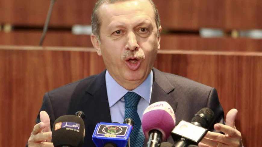 Turkish Prime Minister Recep Tayyip Erdogan gives his speech at the National People's Congress (NPC) in Algiers June 4, 2013.  REUTERS/Louafi Larbi (ALGERIA - Tags: POLITICS) - RTX10BOS
