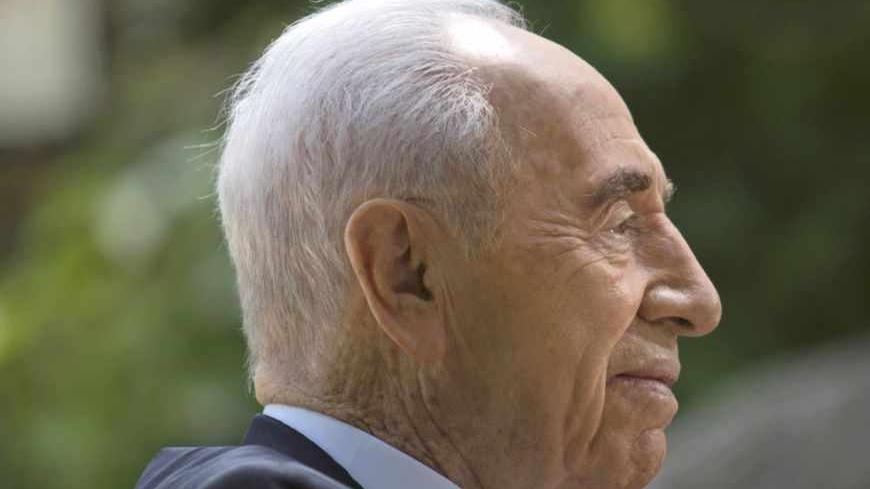 Israel's President Shimon Peres speaks during an interview with Reuters at his residence in Jerusalem June 16, 2013. In a wide-ranging interview with Reuters before his 90th birthday, Peres dismissed the idea that Israel could launch a unilateral military strike against Iran's nuclear facilities and urged Palestinians and Israelis to forge immediate peace. Picture taken June 16, 2013. To match Interview ISRAEL-PERES/  REUTERS/Baz Ratner (JERUSALEM - Tags: POLITICS) - RTX10RKC