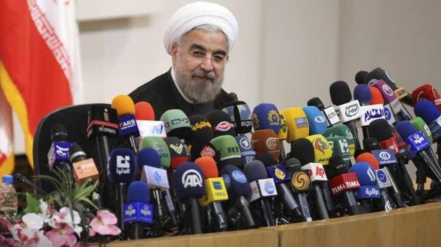 Iranian President-elect Hassan Rohani speaks with the media during a news conference in Tehran June 17, 2013. REUTERS/Fars News/Majid Hagdost  (IRAN - Tags: POLITICS PROFILE) ATTENTION EDITORS - THIS IMAGE WAS PROVIDED BY A THIRD PARTY. FOR  EDITORIAL USE ONLY. NOT FOR SALE FOR MARKETING OR ADVERTISING CAMPAIGNS. THIS PICTURE IS DISTRIBUTED EXACTLY AS RECEIVED BY REUTERS, AS A SERVICE TO CLIENTS - RTX10QWN