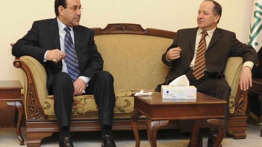(L-R) Ammar al-Hakim, leader of the Supreme Islamic Iraqi Council (ISCI), Iraq's Prime Minister Nuri al-Maliki, Kurdish regional President Masoud Barzani and Iraq's Shi'ite Vice President Adel Abdul-Mahdi attend a meeting in Baghdad November 9, 2010. REUTERS/Iraqi Government/Handout (IRAQ - Tags: POLITICS) FOR EDITORIAL USE ONLY. NOT FOR SALE FOR MARKETING OR ADVERTISING CAMPAIGNS. THIS IMAGE HAS BEEN SUPPLIED BY A THIRD PARTY. IT IS DISTRIBUTED, EXACTLY AS RECEIVED BY REUTERS, AS A SERVICE TO CLIENTS - RTX