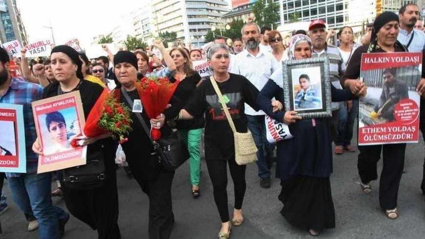 Mothers of slain Turkish protesters lead a march in Ankara on July 26, 2013 to demand justice.