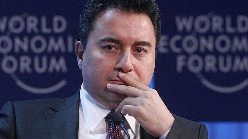 Turkish Deputy Prime Minister for Economic and Financial Affairs Ali Babacan attends a session at the World Economic Forum (WEF) in Davos, January 28, 2012. REUTERS/Christian Hartmann (SWITZERLAND - Tags: POLITICS BUSINESS) - RTR2WZDD