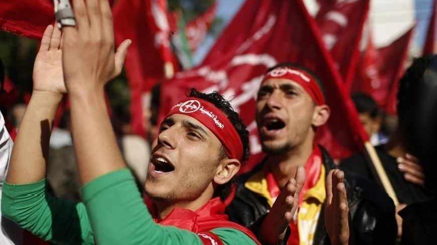 Palestinians take part in a rally organized by the Popular Front for the Liberation of Palestine (PFLP) to celebrate the 45th anniversary of its founding in Gaza City December 6, 2012. REUTERS/Mohammed Salem (GAZA - Tags: POLITICS ANNIVERSARY) - RTR3B9LB