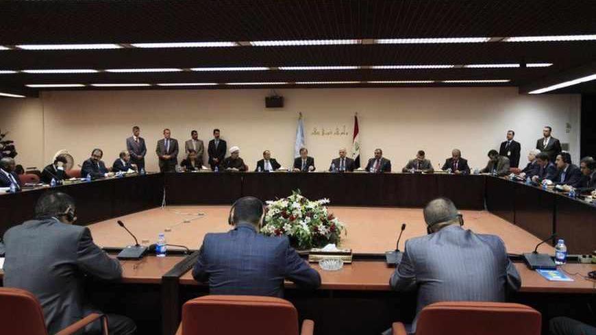 United Nations Secretary-General Ban Ki-moon (centre L) attends a meeting with Iraqi heads of parliamentary blocs at the parliament house in Baghdad, December 6, 2012. REUTERS/Thaier Al-Sudani  (IRAQ - Tags: POLITICS) - RTR3B9XR