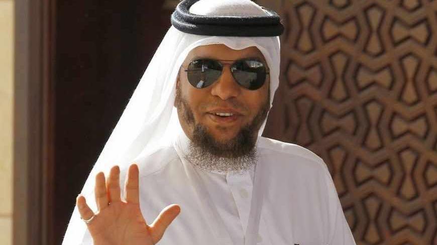 Adnan Bader of the Al-Asala Society, a Sunni pro-government group, waves as he arrives at the National Dialogue session in Manama June 12, 2013. The talks, aimed at ending more than two years of unrest in Bahrain, resumed after a two-week boycott by opposition societies in retaliation against a raid on the home of Ayatollah Sheikh Isa Qassim by security forces.  REUTERS/Hamad I Mohammed (BAHRAIN - Tags: POLITICS) - RTX10LAB
