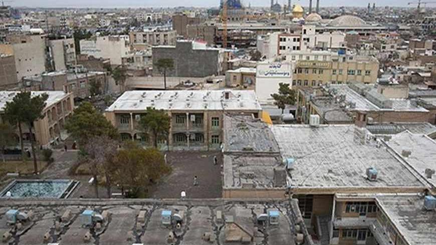 EDITORS' NOTE:  Reuters and other foreign media are subject to Iranian restrictions on their ability to film or take pictures in Tehran.

A view of Hojjatieh seminary (bottom) and the holy shrine of Hazrat Ma'soumeh (top), the sister of the seventh shi'ite Muslim Imam Reza, in the holy city of Qom, 120 Km (75 miles) south of Tehran, March 9, 2011. REUTERS/Morteza Nikoubazl (IRAN - Tags: CITYSCAPE RELIGION) - RTR2JNXQ