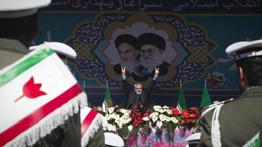 EDITORS' NOTE: Reuters and other foreign media are subject to Iranian restrictions on leaving the office to report, film or take pictures in Tehran.

Hamas Leader Ismail Haniyeh flashes the victory sign during a ceremony to mark the 33rd anniversary of the Islamic Revolution, in Tehran's Azadi square February 11, 2012. Iran's President Mahmoud Ahmadinejad said on the anniversary of the revolution that the Islamic Republic would soon announce "very important" REUTERS/Raheb Homavandi  (IRAN - Tags: ANNIVERS