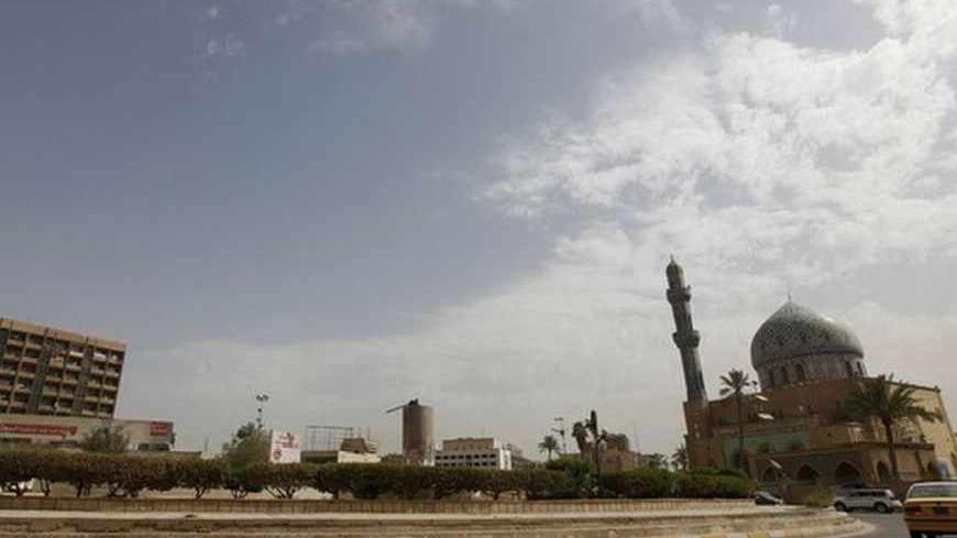 A view of al-Firdous square, where the statue of Saddam Hussein used to stand, in Baghdad April 9, 2012. U.S. Marines pulled down the statue of the dictator on April 9, 2003, marking the end of more than 35 years of iron-fisted rule by Saddam's Baath Party.  REUTERS/Saad Shalash (IRAQ - Tags: CONFLICT POLITICS) - RTR30ITJ