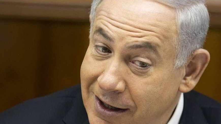 Israel's Prime Minister Benjamin Netanyahu (C) attends the weekly cabinet meeting in Jerusalem June 30, 2013. Netanyahu, in public remarks at the weekly cabinet meeting after his session with U.S. Secretary of State John Kerry, gave no indication Israel and the Palestinians were any closer to resuming peace talks frozen since 2010 by a dispute over Jewish settlements in the occupied West Bank. REUTERS/Menahem Kahana/Pool (JERUSALEM - Tags: POLITICS HEADSHOT) - RTX116RF