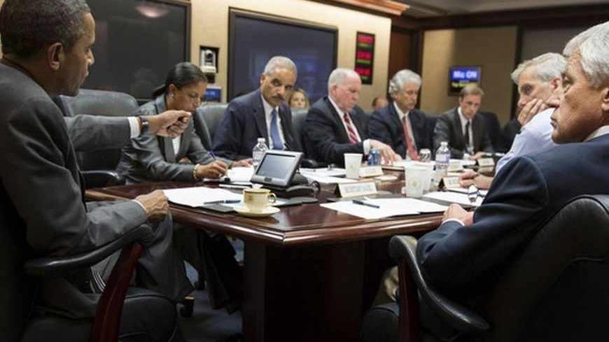 President Barack Obama (L) meets with members of his national security team to discuss the situation in Egypt, in the Situation Room of the White House in Washington July 3, 2013. REUTERS/Pete Souza/White House/Handout via Reuters   (UNITED STATES - Tags: POLITICS CIVIL UNREST) FOR EDITORIAL USE ONLY. NOT FOR SALE FOR MARKETING OR ADVERTISING CAMPAIGNS. THIS IMAGE HAS BEEN SUPPLIED BY A THIRD PARTY. IT IS DISTRIBUTED, EXACTLY AS RECEIVED BY REUTERS, AS A SERVICE TO CLIENTS - RTX11BT1