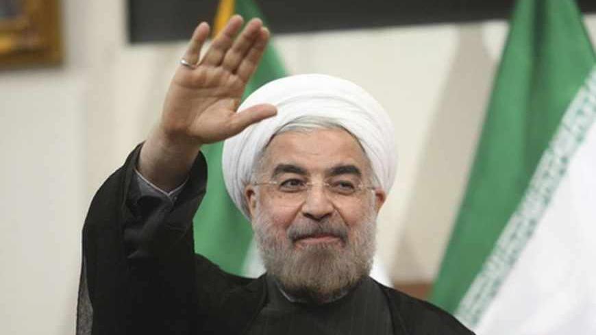Iranian President-elect Hassan Rohani gestures to the media during a news conference in Tehran June 17, 2013. REUTERS/Fars News/Majid Hagdost  (IRAN - Tags: POLITICS PROFILE) ATTENTION EDITORS - THIS IMAGE WAS PROVIDED BY A THIRD PARTY. FOR  EDITORIAL USE ONLY. NOT FOR SALE FOR MARKETING OR ADVERTISING CAMPAIGNS. THIS PICTURE IS DISTRIBUTED EXACTLY AS RECEIVED BY REUTERS, AS A SERVICE TO CLIENTS - RTX10QWD