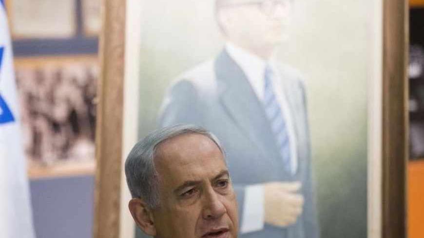 Israel's Prime Minister Benjamin Netanyahu attends a special cabinet meeting in Jerusalem, in commemoration of the 100th anniversary of the birth of late Israeli Prime Minister Menahem Begin July 21, 2013. Netanyahu's tentative agreement to revive U.S.-sponsored peace talks with the Palestinians met scepticism and scorn on Sunday from some members of his rightist coalition government, including within his own party. REUTERS/Uriel Sinai/Pool (JERUSALEM - Tags: POLITICS) - RTX11TOJ