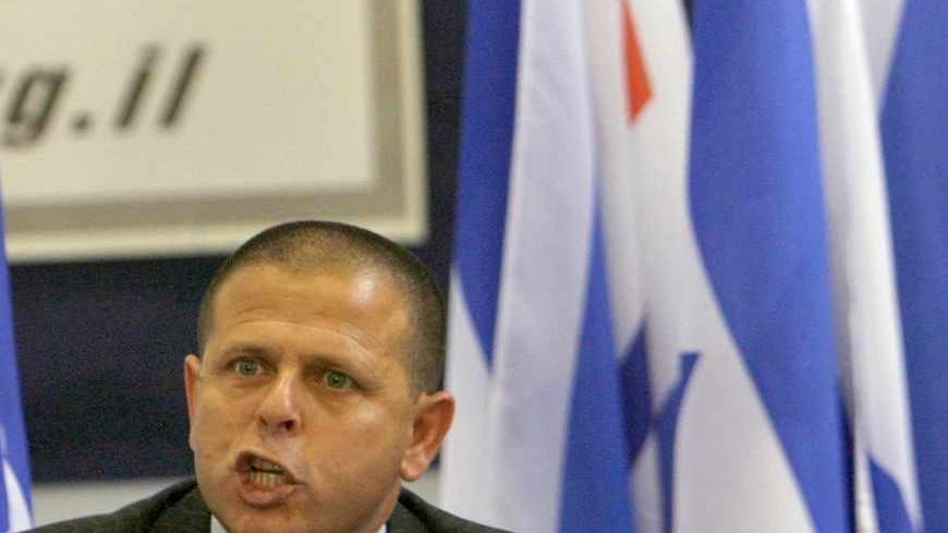 Eitan Cabel, an Israeli minister without portfolio and member of Prime Minister Ehud Olmert's cabinet, holds a news conference in Tel Aviv May 1, 2007.  Cabel announced he was stepping down on Tuesday, opening the first crack in Israel's government after the prime minister vowed to ride out a scathing reprimand by an inquiry into last year's costly Lebanon war.   REUTERS/Gil Cohen Magen (ISRAEL) - RTR1P7RE