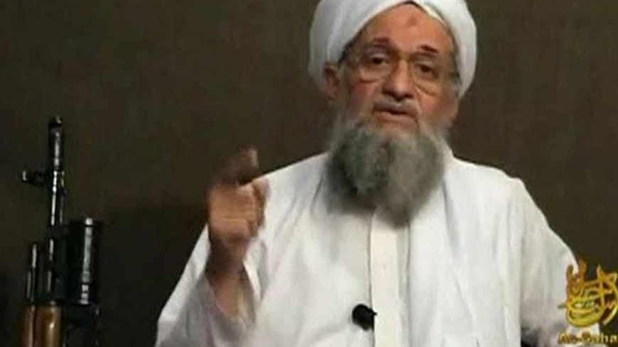 EDITOR'S NOTE: REUTERS IS UNABLE TO INDEPENDENTLY VERIFY CONTENT THE VIDEO FROM WHICH THIS STILL IMAGE WAS TAKEN. 
Al Qaeda's second-in-command Ayman al-Zawahri speaks from an unknown location, in this still image taken from video uploaded on a social media website June 8, 2011. Osama bin Laden's longtime lieutenant, Ayman al-Zawahri, said the United States faces rebellion throughout the Muslim world after killing the al Qaeda leader, according to a 28-minute YouTube recording posted on Wednesday. In what 