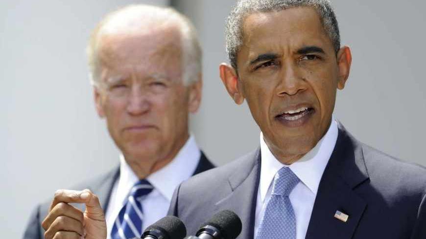 U.S. President Barack Obama speaks about Syria next to Vice President Joe Biden (L) at the Rose Garden of the White House August 31, 2013, in Washington. Obama said on Saturday he had decided the United States should strike Syrian government targets in response to a deadly chemical weapons attack, but said he would seek a congressional vote for any military action.        REUTERS/Mike Theiler (UNITED STATES - Tags: POLITICS) - RTX132W2