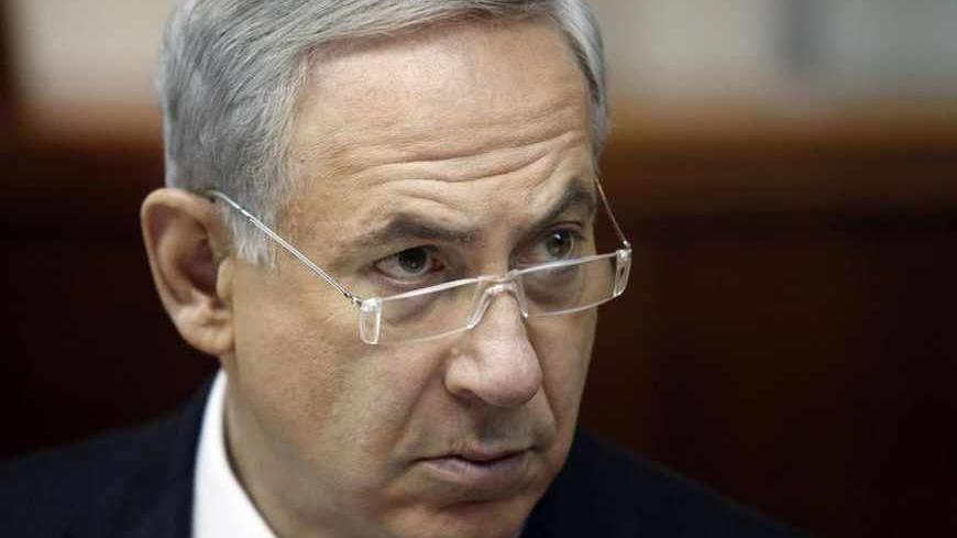 Israel's Prime Minister Benjamin Netanyahu attends the weekly cabinet meeting in Jerusalem August 4, 2013. REUTERS/Gali Tibbon/Pool (JERUSALEM - Tags: POLITICS HEADSHOT) - RTX12A2A