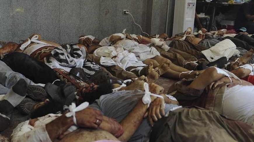 ATTENTION EDITORS - VISUAL COVERAGE OF SCENES OF INJURY OR DEATH

Dead bodies of members of the Muslim Brotherhood and supporters of deposed Egyptian President Mohamed Mursi, lie in a room in a field hospital at the Rabaa Adawiya mosque, where they were camping, in Cairo August 14, 2013. Egyptian security forces killed at least 30 people on Wednesday when they cleared a camp of Cairo protesters who were demanding the reinstatement of Mursi, his Muslim Brotherhood movement said. REUTERS/Amr Abdallah Dalsh 
