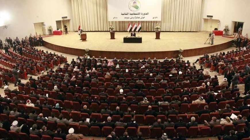 Members of the new Iraqi Parliament attend a session at the Parliament headquarters in Baghdad, November 11, 2010. Iraq's fractious politicians have agreed to return Shi'ite Nuri al-Maliki as prime minister, ending an eight-month deadlock that raised fears of renewed sectarian war, but leaving some Sunnis sceptical he can forge national unity. The pact on top government posts brings together Shi'ites, Sunnis and Kurds in a power-sharing arrangement similar to the last Iraqi government and could help prevent