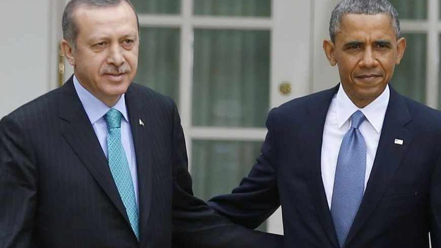 U.S. President Barack Obama (R) and Turkish Prime Minister Recep Tayyip Erdogan arrive for a joint news conference in the White House Rose Garden in Washington, May 16, 2013. REUTERS/Jason Reed (UNITED STATES  - Tags: POLITICS)   - RTXZPAE