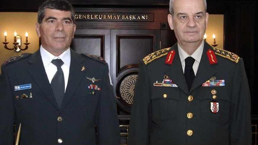Israel's armed forces Chief Lieutenant-General Gabi Ashkenazi (L) and Turkey's Chief of General Staff General Ilker Basbug pose prior to a meeting in Ankara March 15, 2010. Ashkenazi is in Turkey to attend the Global Terrorism and International Cooperation Symposium. REUTERS/Turkish Army Press Office/Handout (TURKEY - Tags: POLITICS MILITARY) FOR EDITORIAL USE ONLY. NOT FOR SALE FOR MARKETING OR ADVERTISING CAMPAIGNS - RTR2BOE7