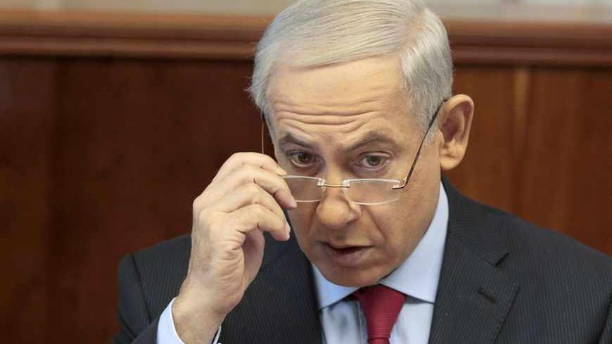 Israel's Prime Minister Benjamin Netanyahu attends the weekly cabinet meeting in Jerusalem September 17, 2013. Netanyahu will meet U.S. President Barack Obama in Washington on September 30, an Israeli official said on Tuesday, for talks expected to focus on Iran's nuclear programme. REUTERS/Ammar Awad (JERUSALEM - Tags: POLITICS) - RTX13O88