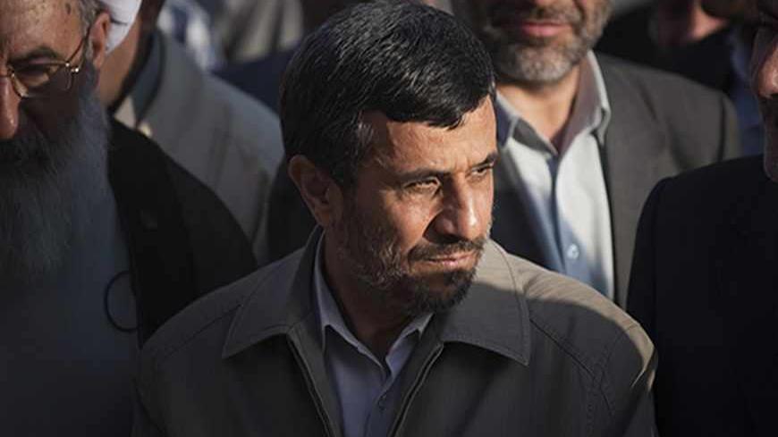 Iranian President Mahmoud Ahmadinejad attends an opening ceremony for the government subsidised Mehr Housing Complex in Tabriz, 633 km (396 miles) northwest of Tehran, July 31, 2011. REUTERS/Morteza Nikoubazl (IRAN - Tags: POLITICS BUSINESS) - RTR2PHMW