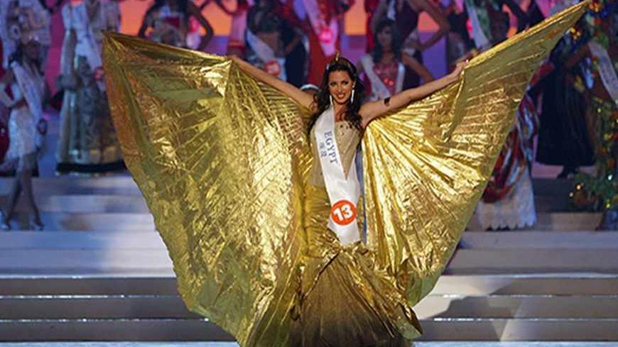 Miss Egypt Elham Wagdi performs during the 46th Miss International Beauty Pageant final in Xianghe, east of Beijing November 11, 2006.   REUTERS/Alfred Cheng Jin   (CHINA) - RTR1J901