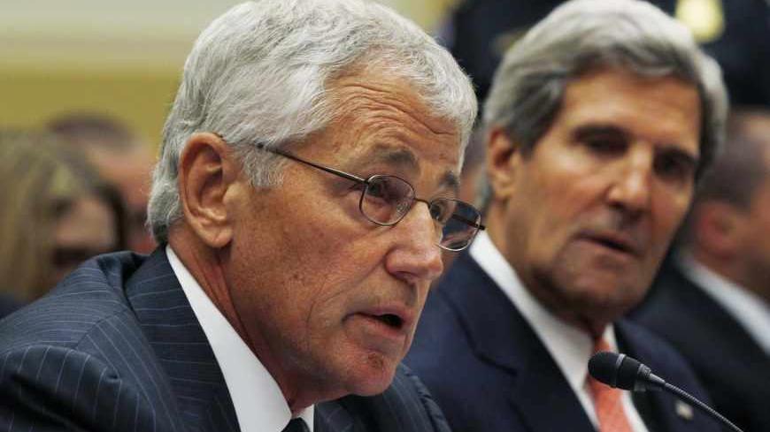 U.S. Secretary of Defense Chuck Hagel (L) testifies alongside Secretary of State John Kerry at a U.S. House Foreign Affairs Committee hearing on Syria on Capitol Hill in Washington, September 4, 2013. The U.S. Senate Foreign Relations Committee will meet on Wednesday afternoon to proceed with its vote on an authorization for the use of military force in Syria, the panel's chairman said in a statement.  REUTERS/Jason Reed (UNITED STATES - Tags: POLITICS MILITARY CONFLICT) - RTX13792