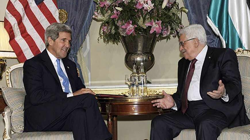 U.S. Secretary of State John Kerry (L) meets with Palestinian President Mahmoud Abbas in London September 8, 2013, to discuss the ongoing Israeli-Palestinian peace talks. REUTERS/Susan Walsh/Pool (BRITAIN - Tags: POLITICS) - RTX13D5A