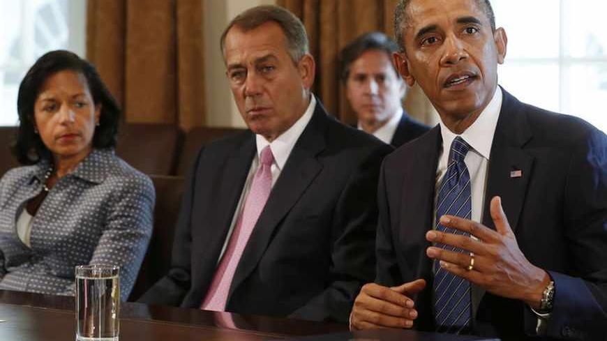 U.S. President Barack Obama meets with bipartisan Congressional leaders in the Cabinet Room at the White House in Washington to discuss a military response to Syria, September 3, 2013. From L-R are: National Security Adviser Susan Rice, Speaker of the House John Boehner, and Obama  REUTERS/Larry Downing  (UNITED STATES - Tags: POLITICS) - RTX135QE