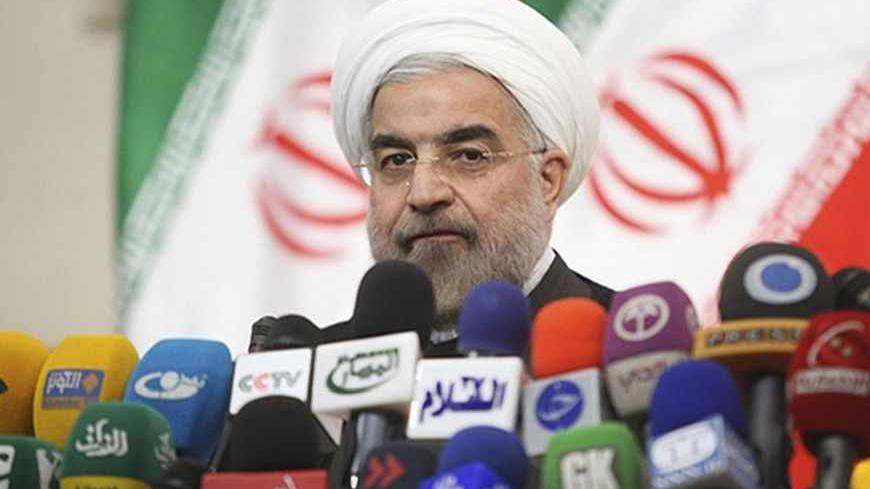 Iranian President-elect Hassan Rohani speaks with the media during a news conference in Tehran June 17, 2013.   REUTERS/Fars News/Majid Hagdost  (IRAN - Tags: POLITICS PROFILE) ATTENTION EDITORS - THIS IMAGE WAS PROVIDED BY A THIRD PARTY. FOR  EDITORIAL USE ONLY. NOT FOR SALE FOR MARKETING OR ADVERTISING CAMPAIGNS. THIS PICTURE IS DISTRIBUTED EXACTLY AS RECEIVED BY REUTERS, AS A SERVICE TO CLIENTS - RTX10QW5