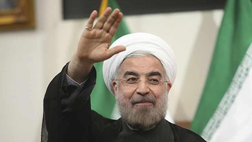 Iranian President-elect Hassan Rohani gestures to the media during a news conference in Tehran June 17, 2013. REUTERS/Fars News/Majid Hagdost  (IRAN - Tags: POLITICS PROFILE) ATTENTION EDITORS - THIS IMAGE WAS PROVIDED BY A THIRD PARTY. FOR  EDITORIAL USE ONLY. NOT FOR SALE FOR MARKETING OR ADVERTISING CAMPAIGNS. THIS PICTURE IS DISTRIBUTED EXACTLY AS RECEIVED BY REUTERS, AS A SERVICE TO CLIENTS - RTX10QWD