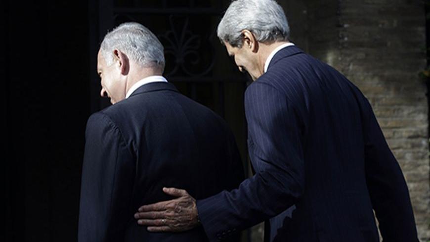U.S. Secretary of State John Kerry (R) walks with Israeli Prime Minister Benjamin Netanyahu at Villa Taverna in Rome October 23, 2013. REUTERS/Gregorio Borgia/Pool   (ITALY - Tags: POLITICS) - RTX14L0M