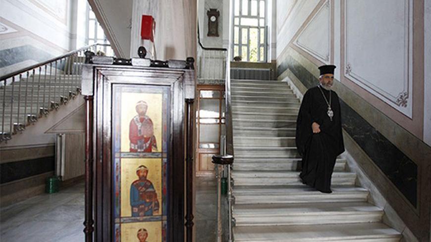 Metropolitan Apostolos Daniilidis, an Orthodox bishop at the monastery attached to the Halki school, is seen at the "Tracing Istanbul", an exhibition of works by Greek artists, at the Greek Orthodox seminary in Heybeliada island near Istanbul September 4, 2010. An Istanbul seminary closed in 1971 is hosting its first public event in 40 years, raising hopes it may shortly be reopened by Turkey and once again educate priests for the Greek Orthodox community. The European Union and the United States have press