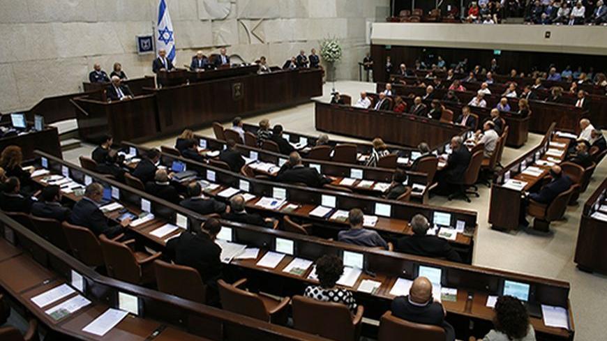 A general view shows the plenum as Israel's Prime Minister Benjamin Netanyahu speaks at the opening of the winter session of the Knesset, the Israeli parliament, in Jerusalem October 14, 2013. REUTERS/Ronen Zvulun (JERUSALEM - Tags: POLITICS) - RTX14AZT