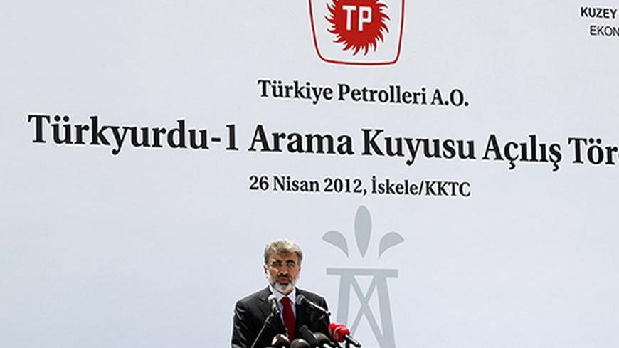Turkey's Energy Minister Taner Yildiz addresses the audience during a ceremony in Famagusta April 26, 2012. Turkish Cypriot leader Dervis Eroglu and Yildiz attended the ceremony marking the start of joint gas and oil exploration works in northern Cyprus between Turkey's state-owned energy company TPAO and the Turkish-Cypriot administration. REUTERS/Umit Bektas (CYPRUS - Tags: POLITICS ENERGY BUSINESS) - RTR318P5
