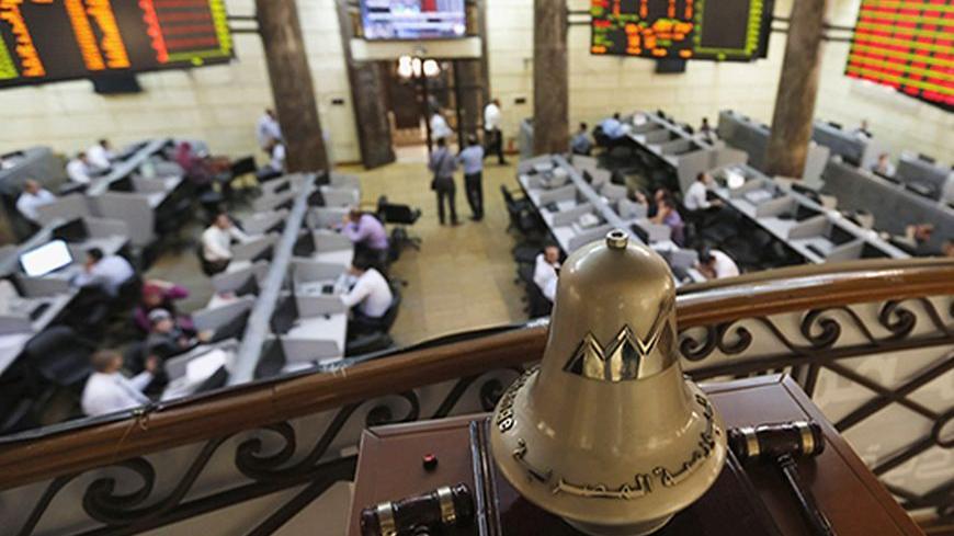 A general view of the Egyptian stock exchange in Cairo August 18, 2013. Egypt's stock market fell sharply on Sunday as it resumed trading after hundreds of people were killed in a crackdown by the army-backed government on supporters of the Muslim Brotherhood. Banks and the stock market reopened for the first time since Wednesday's carnage, with shares rapidly falling 2.5 percent.   REUTERS/Louafi Larbi (EGYPT - Tags: POLITICS CIVIL UNREST BUSINESS) - RTX12PJU