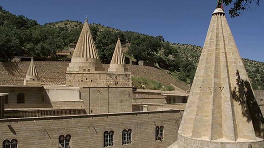 View of Yezidi temple in Lalish some 50 km north from Iraqi city of
Mosul May 11, 2003. The Yezidi religion, seen by its followers as the
original Kurdish faith, is believed to date back several thousand years
and blends ideas from sources as diverse as Zoroastrianism, Islam and
Christianity. REUTERS/Shamil Zhumatov REUTERS

SZH/AS - RTRNBQ2