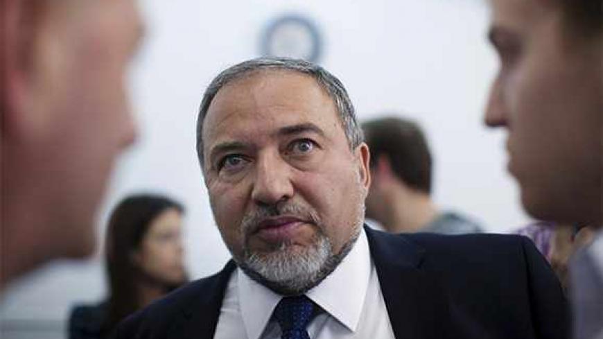 Former Israeli foreign minister Avigdor Lieberman is seen in Jerusalem's magistrate court at the continuation of his trial, April 25, 2013. Lieberman was indicted on charges relating to the promotion of an Israeli diplomat who had illegally given him information about a police investigation against him. The allegations led Lieberman, a key ally of Prime Minister Benjamin Netanyahu, to resign from cabinet last December. REUTERS/Uriel Sinai/Pool (JERUSALEM - Tags: POLITICS CRIME LAW) - RTXYZEJ