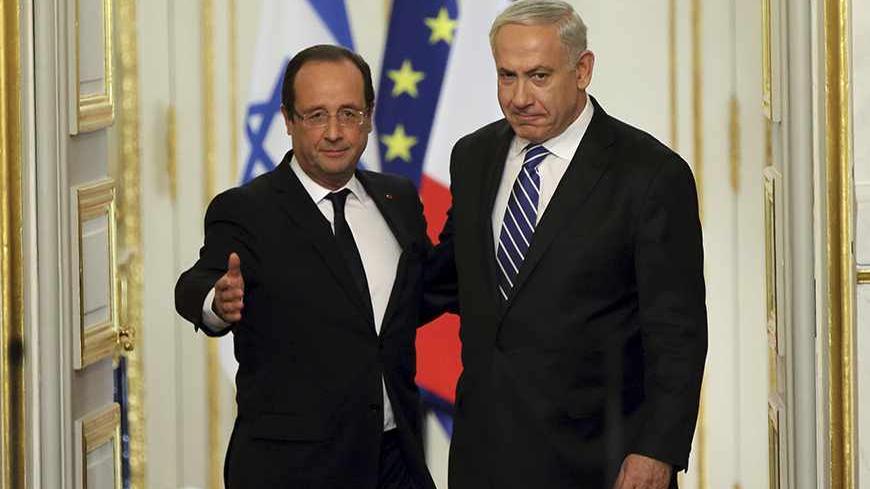 France's President Francois Hollande (L) and Israel's Prime Minister Benjamin Netanyahu arrive to attend a joint news conference at the Elysee Palace in Paris, October 31, 2012.  REUTERS/Philippe Wojazer  (FRANCE - Tags: POLITICS) - RTR39TB0