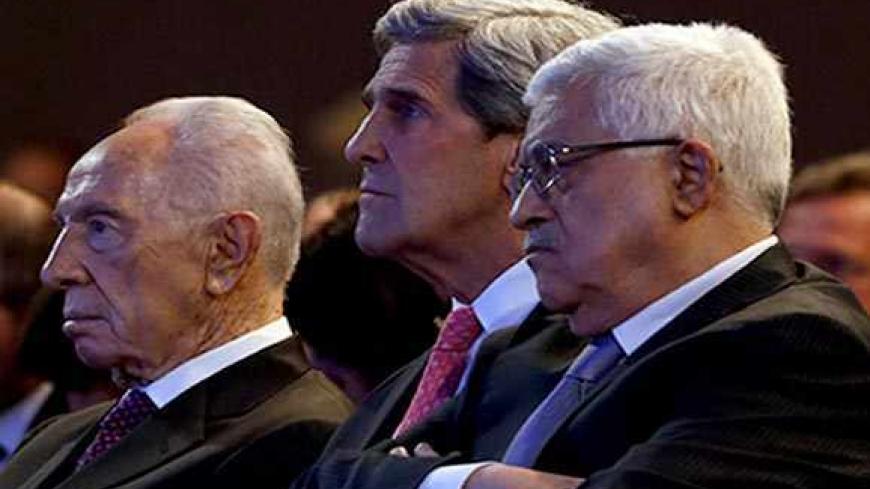 U.S. Secretary of State John Kerry (C) is joined by Israeli President Shimon Peres (L) and Palestinian President Mahmoud Abbas at the World Economic Forum on the Middle East and North Africa at the King Hussein Convention Centre, at the Dead Sea, Jordan, May 26, 2013.  REUTERS/Jim Young  (JORDAN - Tags: POLITICS BUSINESS) - RTX101SH